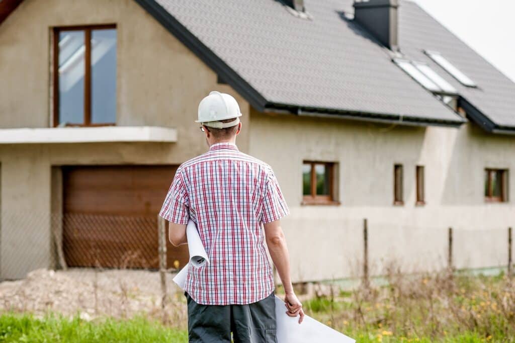 HOAI Leistungsphasen 1-9 einfach erklärt Architekt-vor-Gebaeude